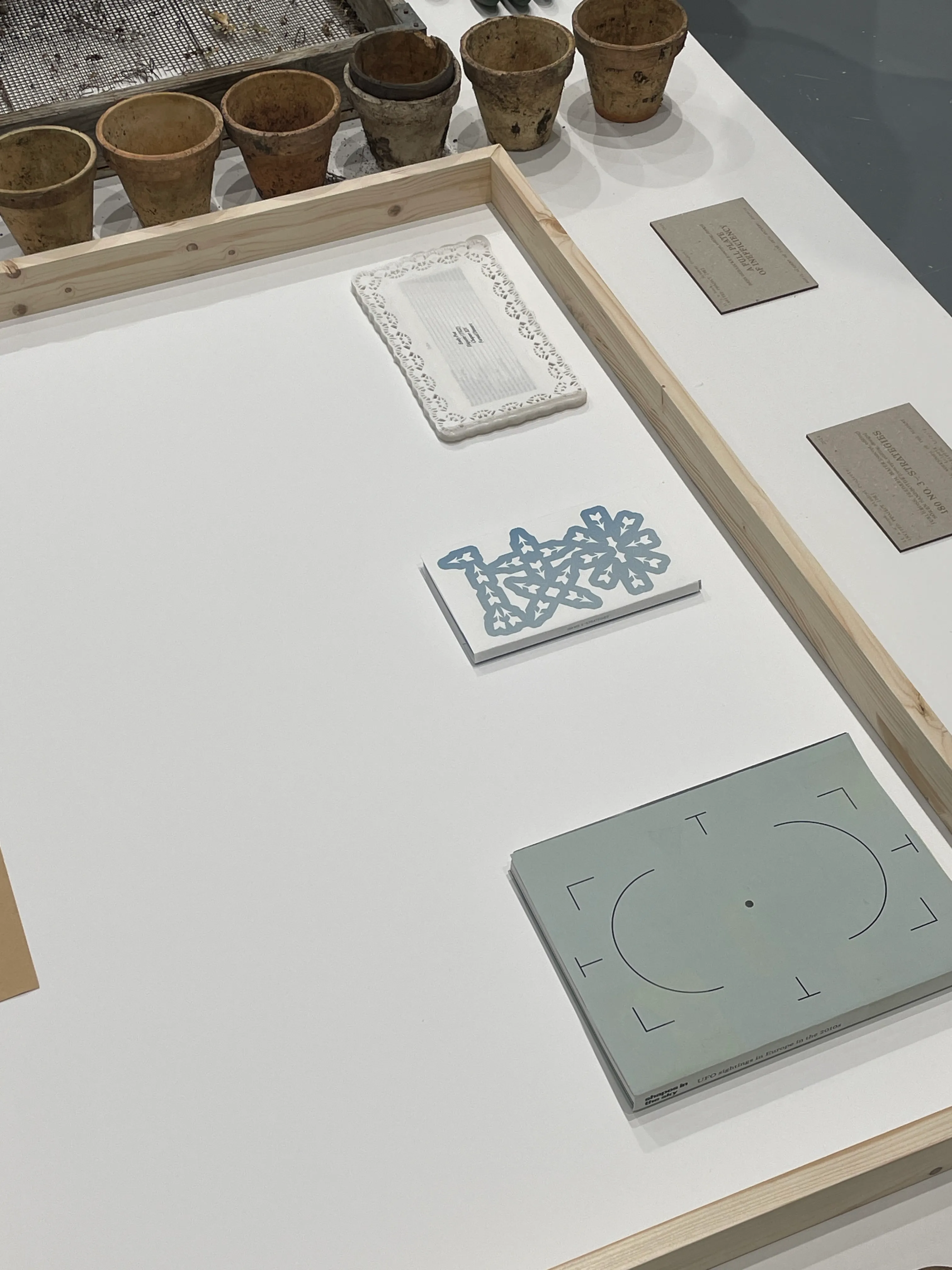 The book displayed at the It's a book exhibition alongside two other selected books.